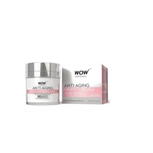 Applying WOW Skin Science Anti Aging Night Cream to face.